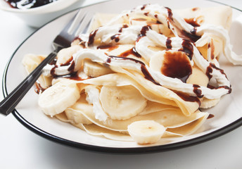 Crepes with banana and chocolate