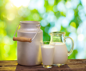 Fresh organic milk. Nature background.