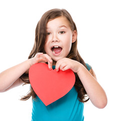 Happiness - smiling girl with red heart