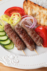 Kebab, meat skewer with fresh vegetable