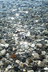 Gravel stones at the sea bottom.