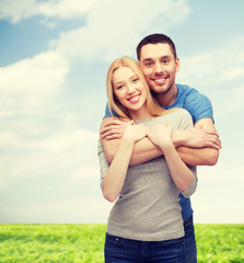 smiling couple hugging