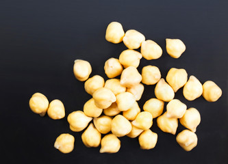 Golden  Chick-pea cereal  over black  chalk board