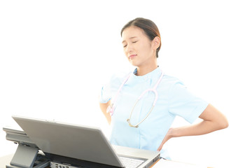 疲れた表情の看護士