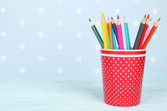 Plastic cup with different pencils