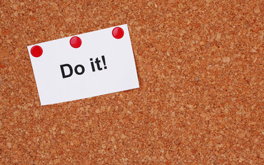 Motivating paper sheet with inscription "Do it"