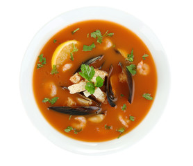 Tasty mussel soup isolated on white