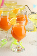 Glasses of fruit cocktails in party close-up