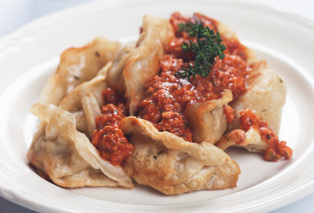 Fried noodles in tomato sauce