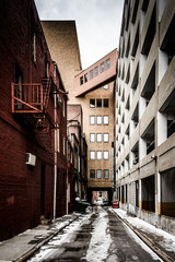 Narrow alley and parking garage in Baltimore, Maryland.