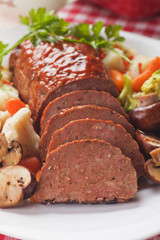 Classic meatloaf with mushrooms and vegetables