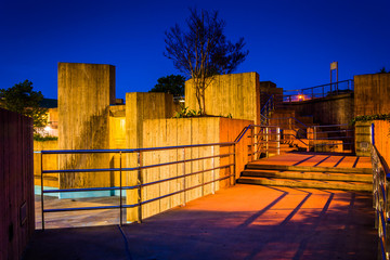 Stairs on an elevated walkway at night in Baltimore, Maryland.