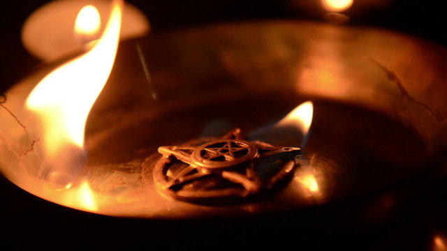 Ancient pentagram burning