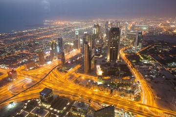 Naklejka na ściany i meble Dubai view of the night from the lookout Burj Khalifa