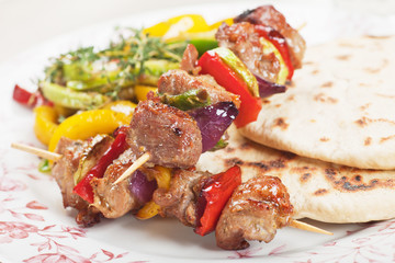 Meat and vegetable on skewer