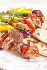 Meat and vegetable on skewer