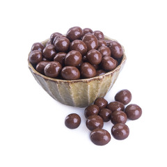 chocolate balls. chocolate balls in bowl on a background