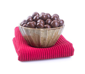 chocolate balls. chocolate balls in bowl on a background