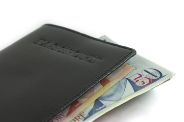 Passport and singapore banknote on white background