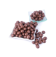 chocolate balls. chocolate balls in bowl on a background