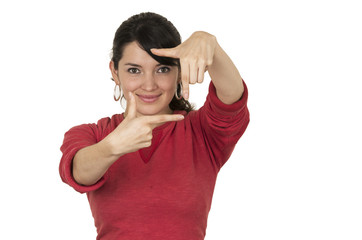 pretty young girl wearing red top posing making frame with hands