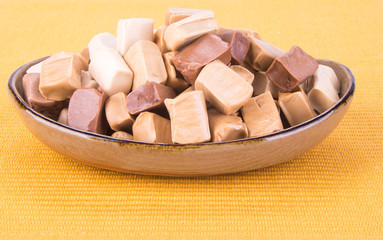 candies. caramel candies. caramel candies on a background. caram