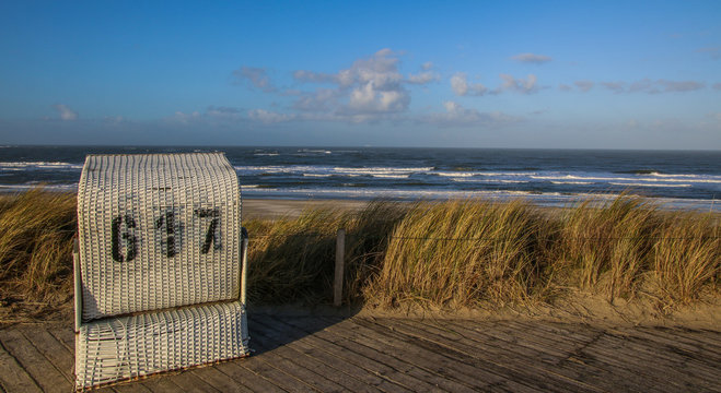 strandkorbvermietung-bilder-bl-ddra-bland-292-stockfoton-vektorer