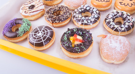 Assorted donuts donuts on a background