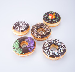 Assorted donuts donuts on a background