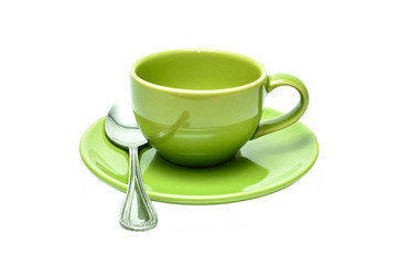 Green tea cup with spoon. Isolated on white background