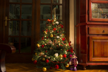 Christmas tree with lights on at home