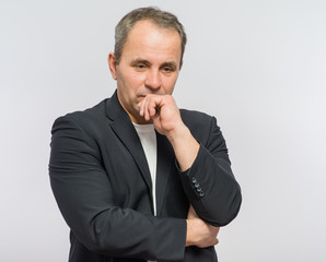 Thoughtful businessman portrait