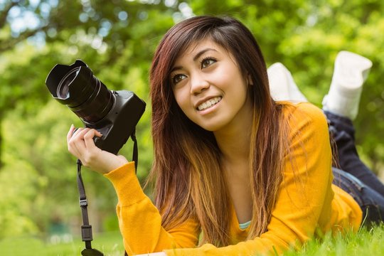 Female photographer at park