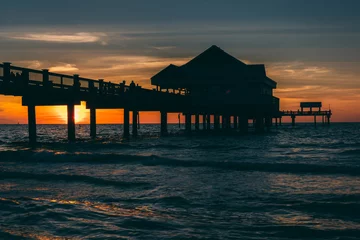 Cercles muraux Clearwater Beach, Floride Fishing pier in the Gulf of Mexico at sunset,  Clearwater Beach,