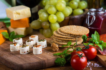 small cheese bites on with herbs