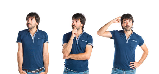 Man thinking over isolated white background