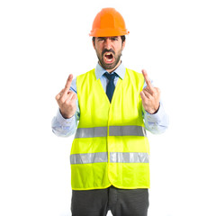 Workman making horn gesture