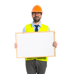 Workman holding empty placard