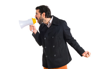 Fototapeta premium Man shouting by megaphone