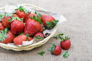 Fresh strawberry in a wicker basket