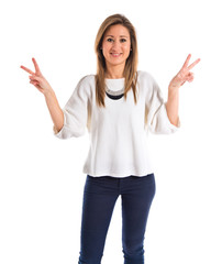 Woman doing victory gesture