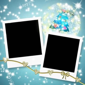 Two instant photo frames and christmas tree within a ball
