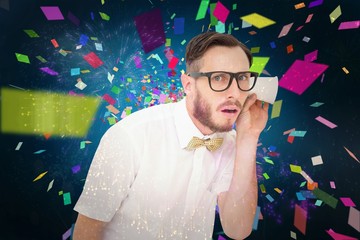 Composite image of geeky businessman eavesdropping with cup