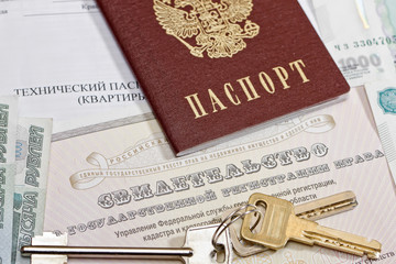 passport, keys and the certificate of ownership of the apartment