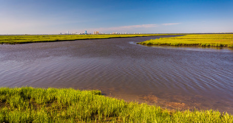 Fototapeta premium Marsh and view of Atlantic City at Edwin B. Forsythe National Wi