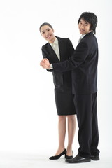 스튜디오에 있는 아시안 비즈니스 여성과 남성