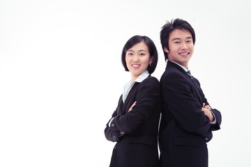 등을 맞대고 서있는 비즈니스 여성과 남성