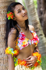 Girl rests on a tree