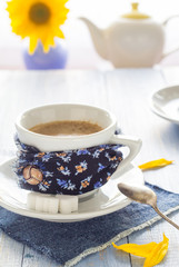 coffee cup black wooden board brown white jug milk sunflower