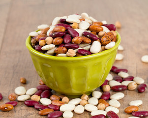 various beans on wooden surface
